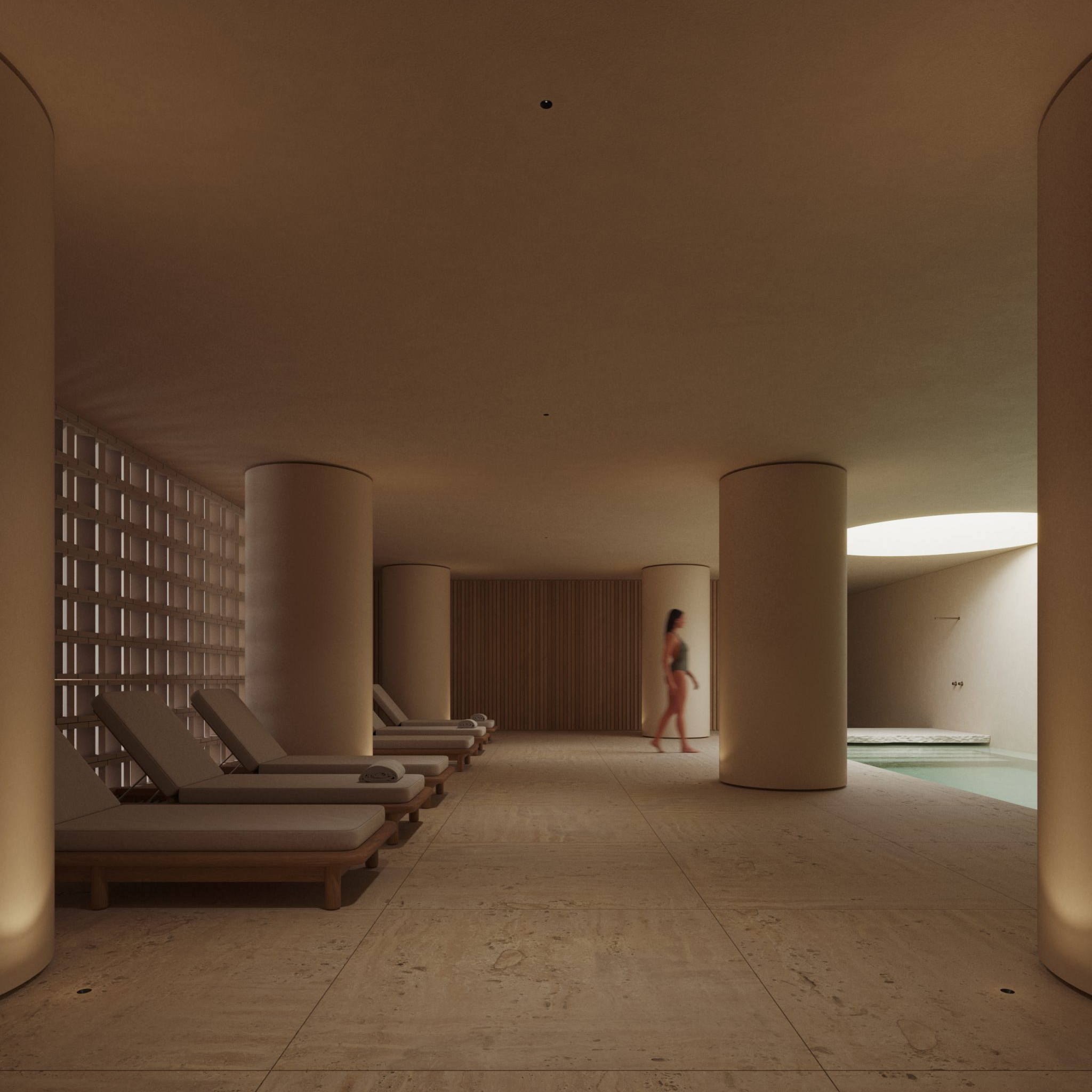 Interior d'un SPA d'hotel reformat al Maresme per a [Nom del teu Despatx]. Disseny arquitectònic minimalista amb llum zenital, tons càlids i materials naturals per a la zona d'aigües.